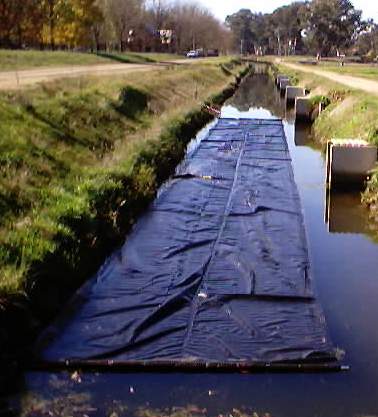 Floating weed control protecting water supply channel