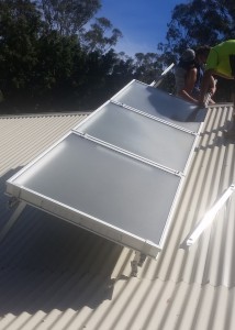 Installing third SAM solar heating collector