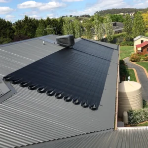 UltimateBlue-Solar-on=a-Grey-Tin-Roof