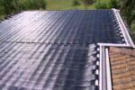Flat roof solar pool heating