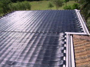 Flat roof solar pool heating